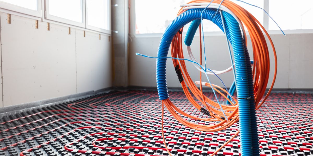 Floor heating and electrical outputs in a new building. Interior design and finishing industry. Office and apartment