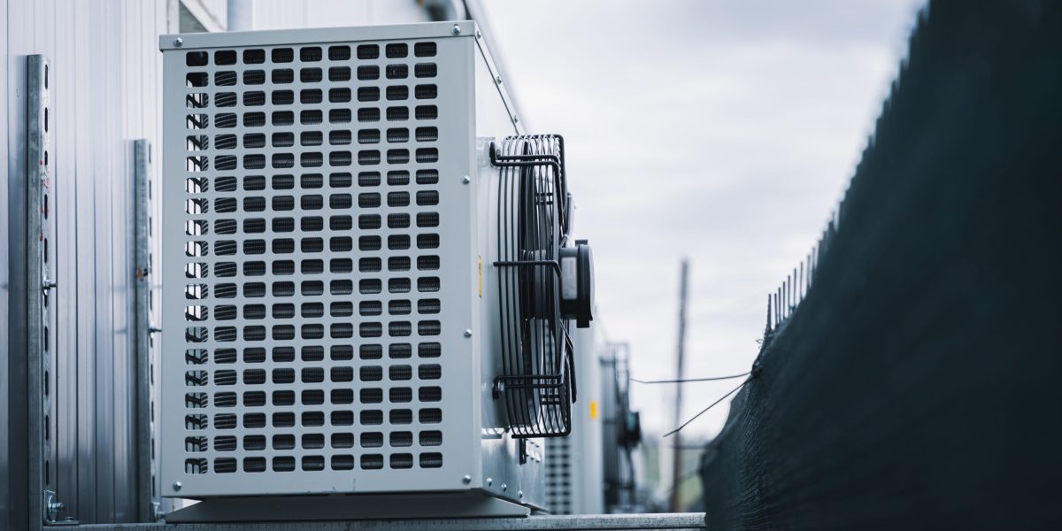 industrial ventilation devices mounted outside the hall